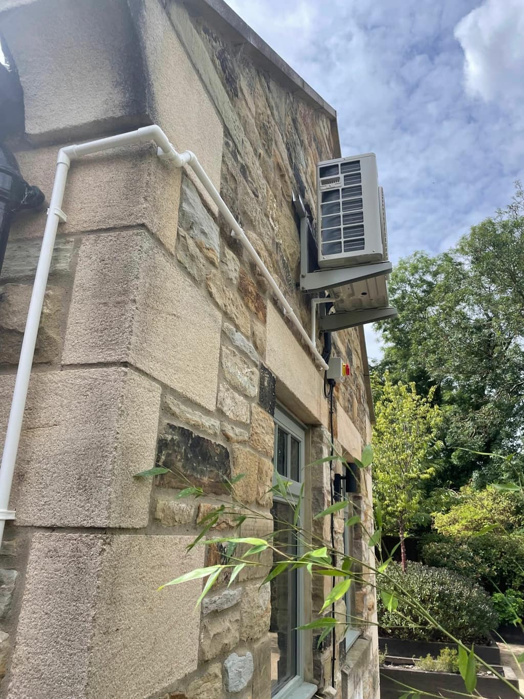 Air conditioning installation on a stone building fitted by UK Aircon, air conditioning installers serving Newcastle