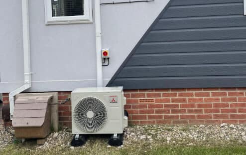 Home air conditioning outdoor unit on a ground stand fitted by UK Aircon, air conditioning installers serving Newcastle